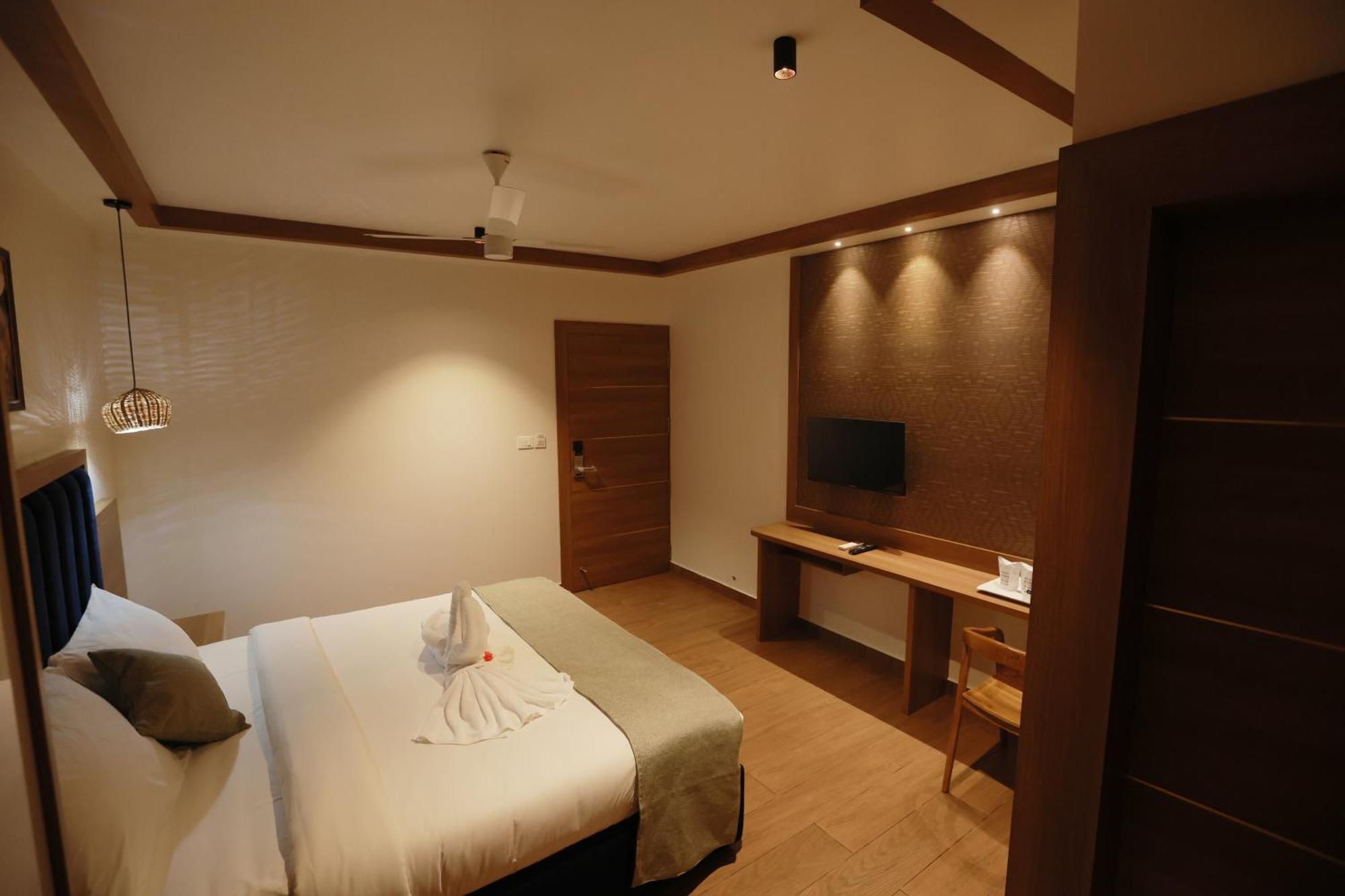 Hotel Cmk Habitat Centre Kochi Exterior foto